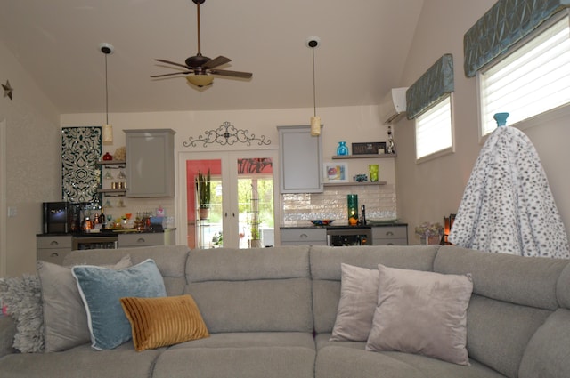 1618 Kickapoo Ter, Effort, PA 18330 - living room featuring lofted ceiling, a ceiling fan, french doors, an AC wall unit, and a dry bar