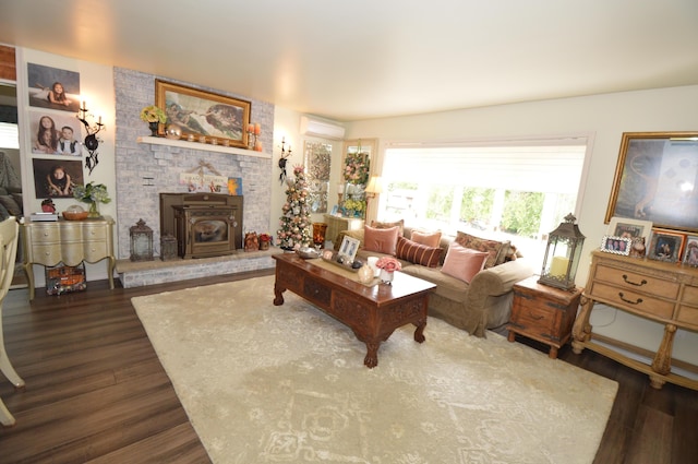 1618 Kickapoo Ter, Effort, PA 18330 - living area featuring a wall unit AC, dark wood-type flooring, and a wood stove