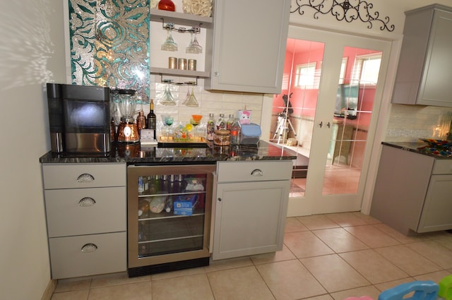 1618 Kickapoo Ter, Effort, PA 18330 - kitchen with wine cooler, open shelves, backsplash, dark stone countertops, and gray cabinetry