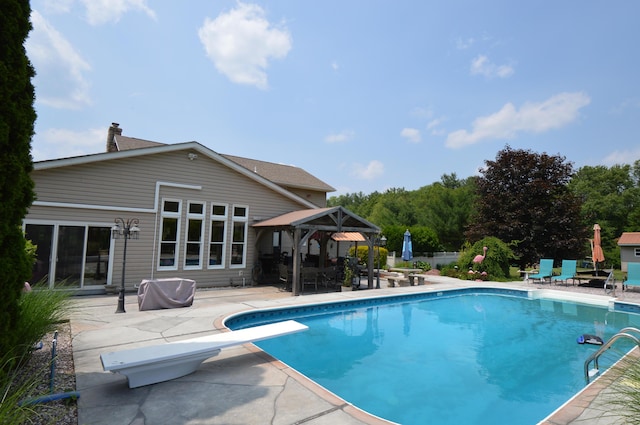 1618 Kickapoo Ter, Effort, PA 18330 - swimming pool featuring a diving board, a gazebo, and a patio area