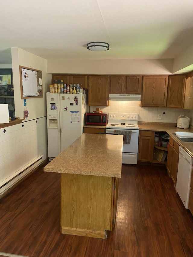 139 Davis Cir, Bushkill, PA 18324 - kitchen featuring white appliances, under cabinet range hood, dark wood-type flooring, baseboard heating, and a kitchen island