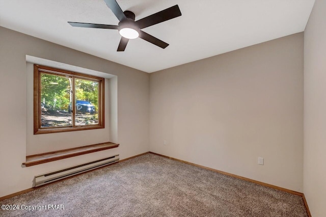 carpeted spare room featuring ceiling fan, baseboard heating, and baseboards