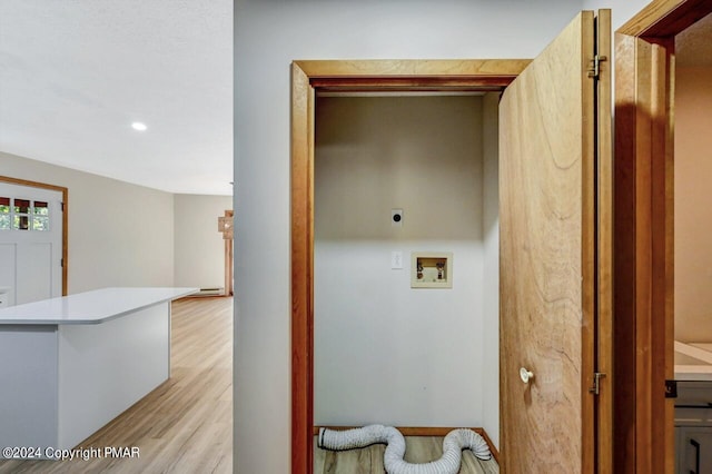 laundry room featuring hookup for a washing machine, recessed lighting, hookup for an electric dryer, light wood-type flooring, and laundry area