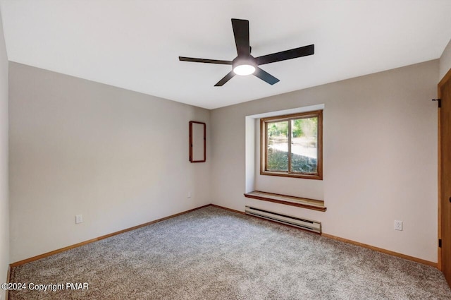 carpeted empty room with baseboards, a baseboard heating unit, and a ceiling fan