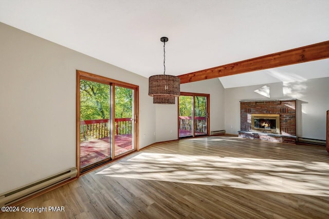 unfurnished living room with lofted ceiling with beams, wood finished floors, baseboard heating, a fireplace, and a baseboard heating unit