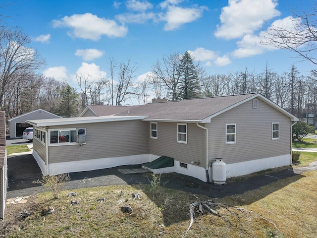 148 Summit Ave, Pocono Summit, PA 18346 - exterior space featuring roof with shingles and a chimney