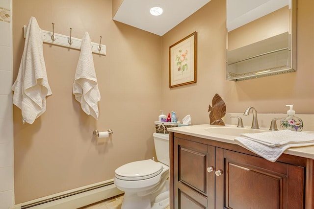 148 Summit Ave, Pocono Summit, PA 18346 - bathroom with baseboard heating, toilet, tile patterned flooring, and vanity