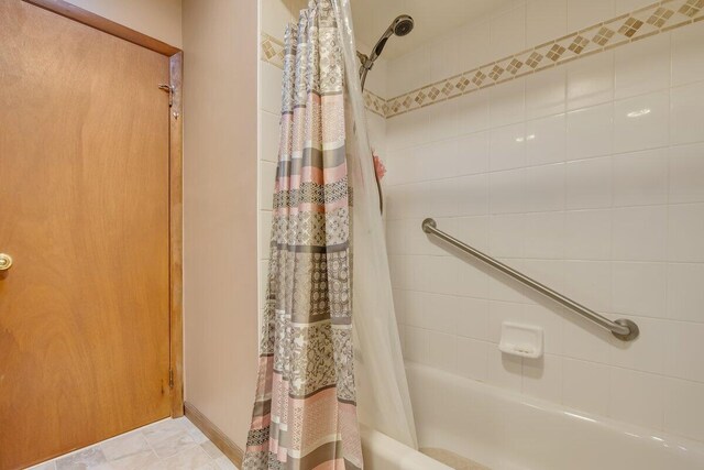 148 Summit Ave, Pocono Summit, PA 18346 - bathroom featuring shower / bath combo with shower curtain