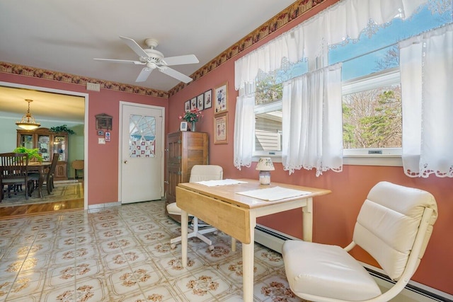 148 Summit Ave, Pocono Summit, PA 18346 - dining space with tile patterned floors, baseboard heating, ceiling fan, baseboards, and visible vents