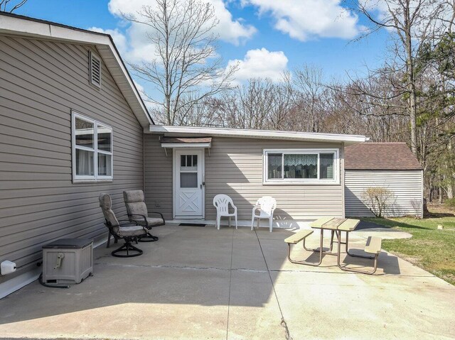 148 Summit Ave, Pocono Summit, PA 18346 - back of property with a patio area