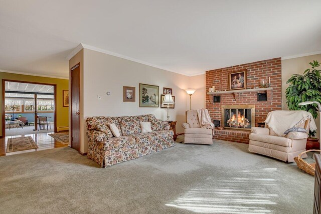 148 Summit Ave, Pocono Summit, PA 18346 - living area with a fireplace, carpet floors, and crown molding