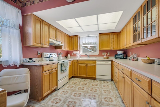 148 Summit Ave, Pocono Summit, PA 18346 - kitchen with a sink, under cabinet range hood, glass insert cabinets, white appliances, and light countertops