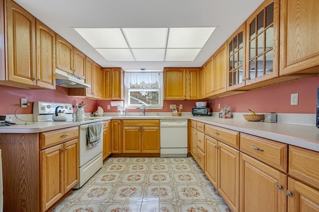 148 Summit Ave, Pocono Summit, PA 18346 - kitchen featuring white appliances, glass insert cabinets, under cabinet range hood, light countertops, and a sink