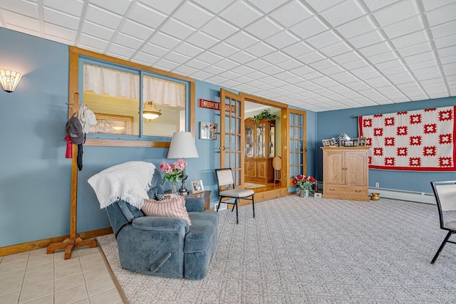 148 Summit Ave, Pocono Summit, PA 18346 - living area with baseboards, baseboard heating, and tile patterned floors