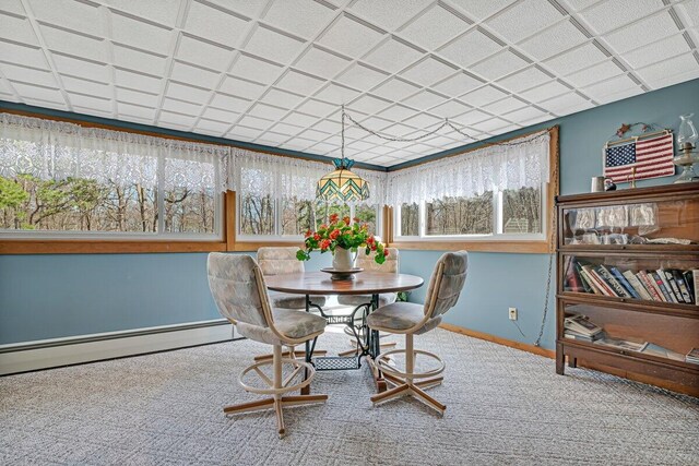 148 Summit Ave, Pocono Summit, PA 18346 - carpeted dining space with baseboard heating and baseboards