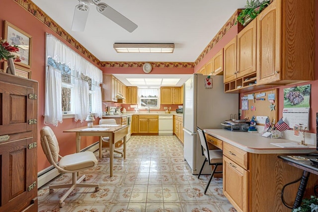 148 Summit Ave, Pocono Summit, PA 18346 - kitchen featuring ceiling fan, white appliances, light countertops, baseboard heating, and light floors