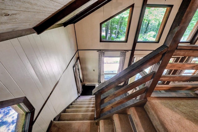 13 Sheffick Rd, Clifton Township, PA 18424 - stairway featuring plenty of natural light, beamed ceiling, high vaulted ceiling, wooden walls, and a baseboard radiator