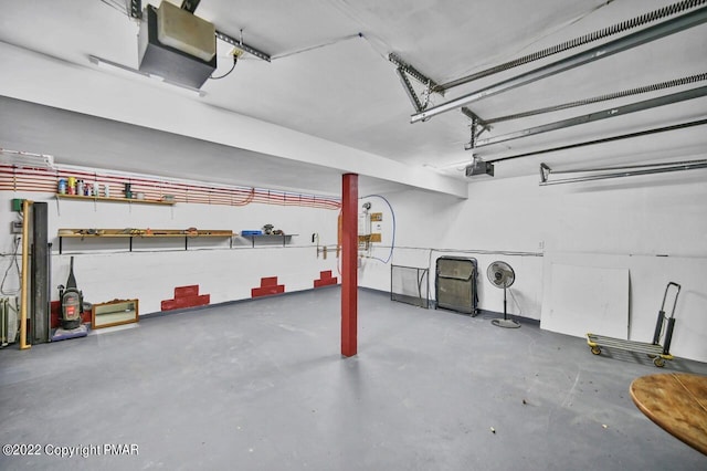 garage featuring a garage door opener
