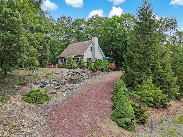 2218 Lancaster Dr, Lehman, PA 18324 - view of home's exterior featuring a chimney