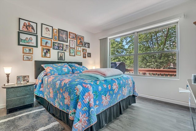 2218 Lancaster Dr, Lehman, PA 18324 - bedroom with baseboards and wood finished floors