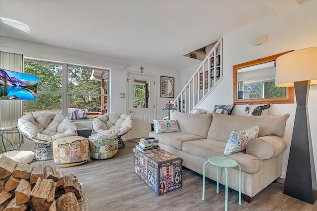 2218 Lancaster Dr, Lehman, PA 18324 - living area featuring wood finished floors and stairway
