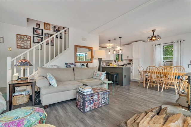 2218 Lancaster Dr, Lehman, PA 18324 - living room featuring stairs and wood finished floors