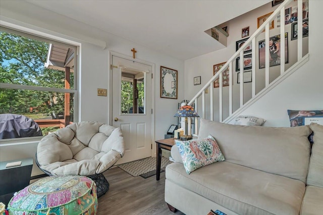 2218 Lancaster Dr, Lehman, PA 18324 - living area with healthy amount of natural light, wood finished floors, and stairs