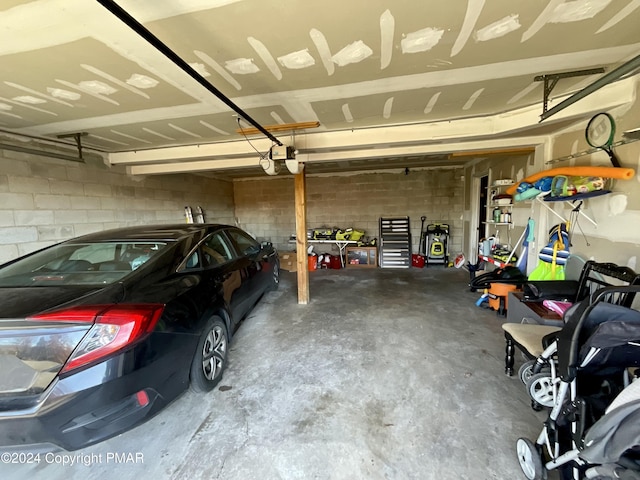 garage featuring a garage door opener