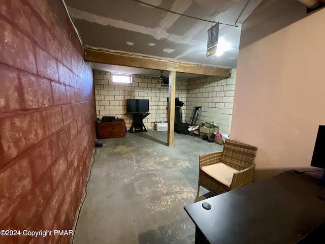 basement with concrete block wall