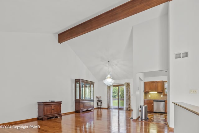 living room with light wood finished floors, visible vents, baseboards, beam ceiling, and a notable chandelier