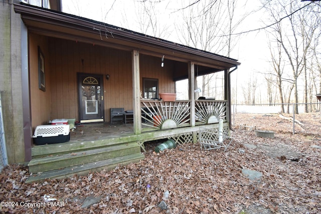 entrance to property with a porch