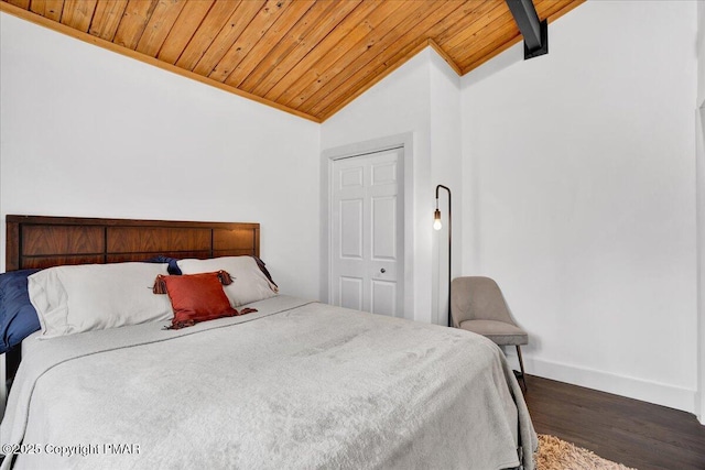 9871 Deerwood Dr, Tobyhanna, PA 18466 - bedroom featuring lofted ceiling, wooden ceiling, dark wood finished floors, and baseboards