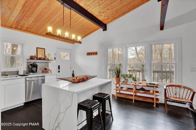 9871 Deerwood Dr, Tobyhanna, PA 18466 - kitchen with dishwasher, wood ceiling with exposed beams, white cabinetry, a breakfast bar, and dark wood finished floors