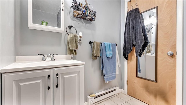 3954 Cedar Dr, Walnutport, PA 18088 - bathroom featuring a baseboard radiator, tile patterned floors, and vanity