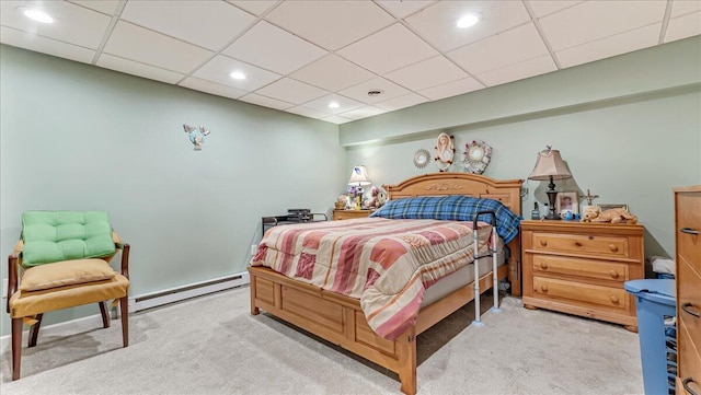3954 Cedar Dr, Walnutport, PA 18088 - carpeted bedroom with a baseboard heating unit, recessed lighting, and a paneled ceiling