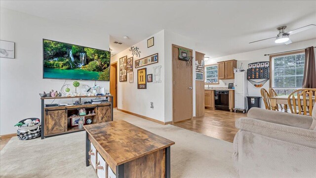3954 Cedar Dr, Walnutport, PA 18088 - living room with light colored carpet and a ceiling fan