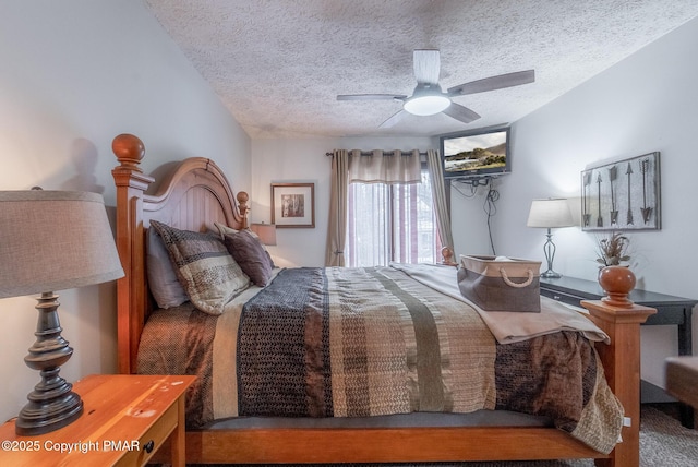 bedroom featuring ceiling fan and a textured ceiling