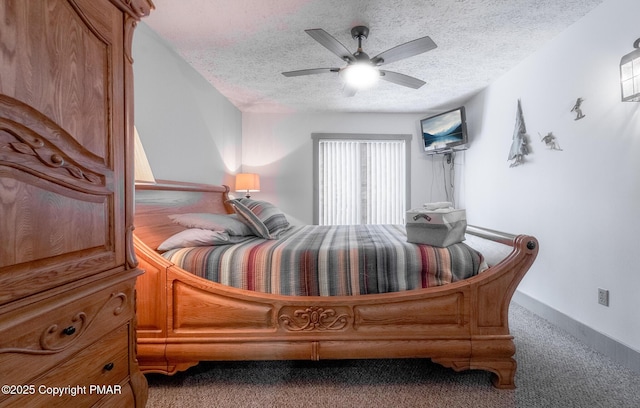 bedroom featuring carpet floors, baseboards, a ceiling fan, and a textured ceiling