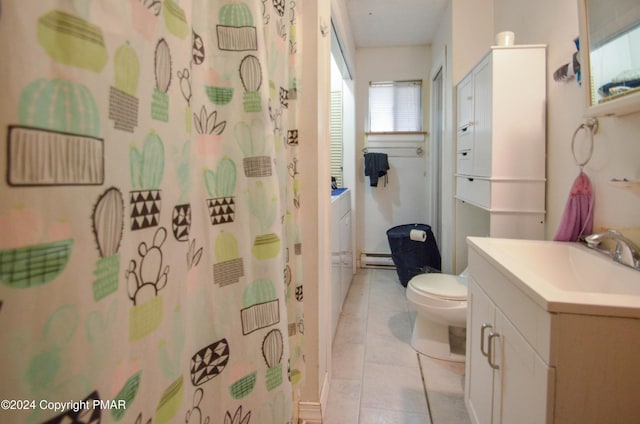 full bath with toilet, a baseboard heating unit, a shower with shower curtain, tile patterned flooring, and vanity