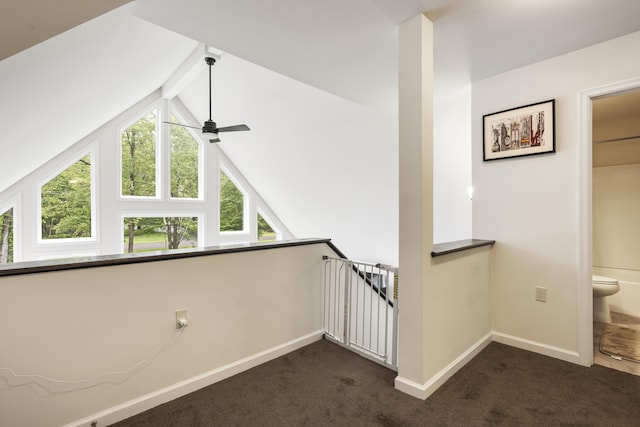 4130 Mill Creek Dr, Cresco, PA 18326 - corridor with dark colored carpet, an upstairs landing, and vaulted ceiling