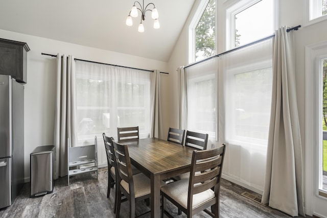 4130 Mill Creek Dr, Cresco, PA 18326 - dining room featuring dark wood-style flooring, lofted ceiling, and a chandelier