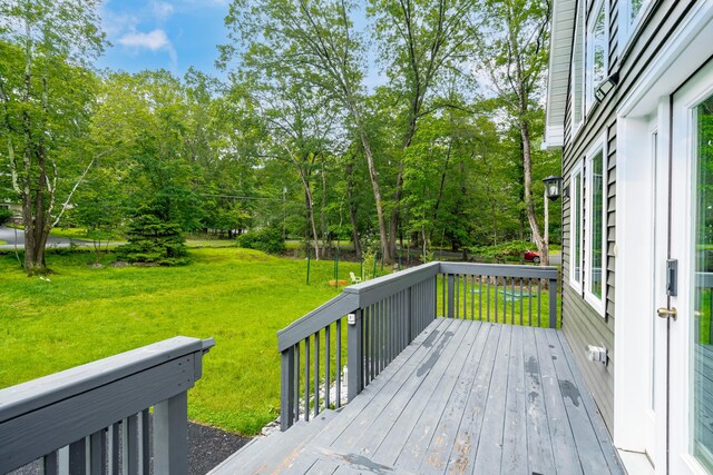 4130 Mill Creek Dr, Cresco, PA 18326 - deck featuring a lawn and view of wooded area