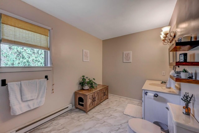 bathroom with vanity, marble finish floor, baseboard heating, and toilet