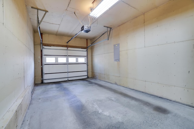 476 Hyland Dr, East Stroudsburg, PA 18301 - garage featuring a garage door opener and electric panel