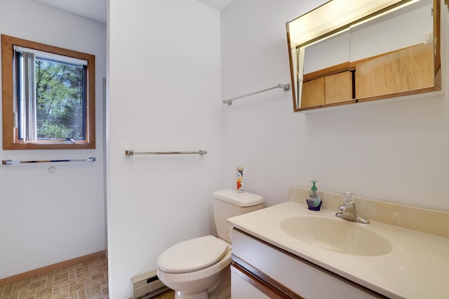 476 Hyland Dr, East Stroudsburg, PA 18301 - bathroom featuring baseboards, a baseboard radiator, toilet, and vanity