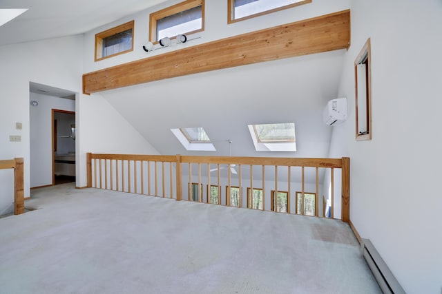 476 Hyland Dr, East Stroudsburg, PA 18301 - interior space with a wall mounted air conditioner, high vaulted ceiling, a baseboard heating unit, carpet flooring, and a skylight