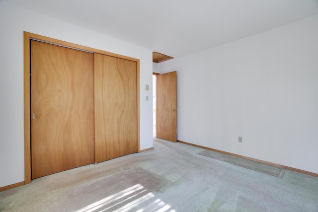 476 Hyland Dr, East Stroudsburg, PA 18301 - unfurnished bedroom with a closet, baseboards, and carpet flooring