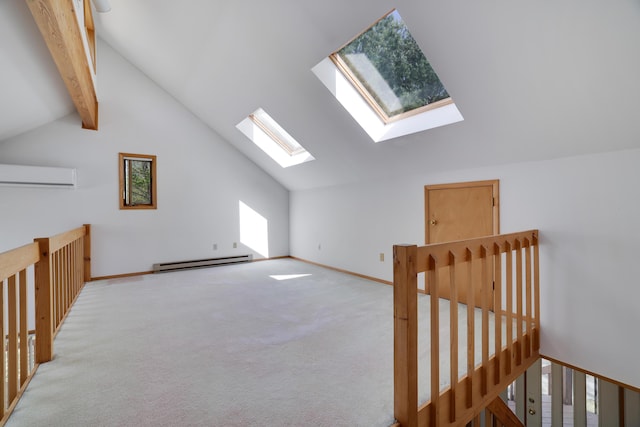476 Hyland Dr, East Stroudsburg, PA 18301 - bonus room featuring carpet floors, baseboards, an AC wall unit, a baseboard heating unit, and lofted ceiling with skylight