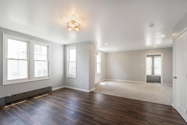 247 S 7th St, Lehighton, PA 18235 - spare room featuring recessed lighting, dark wood finished floors, a baseboard heating unit, and a smoke detector