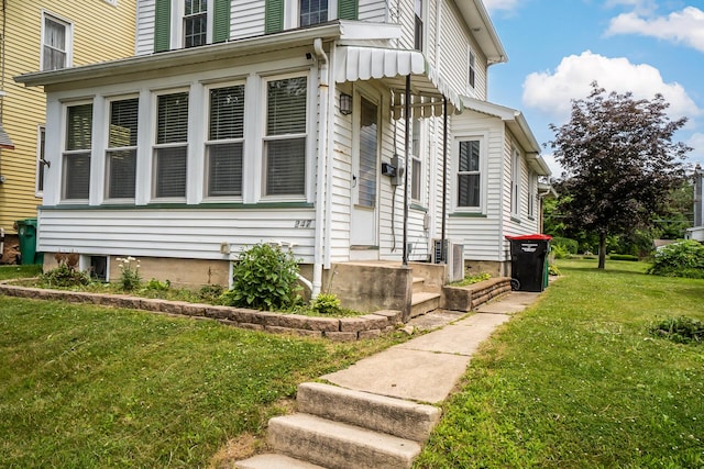 247 S 7th St, Lehighton, PA 18235 - view of property exterior featuring a yard